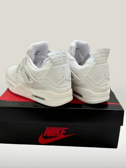 Detail shot of Jordan 4 White tongue and logo