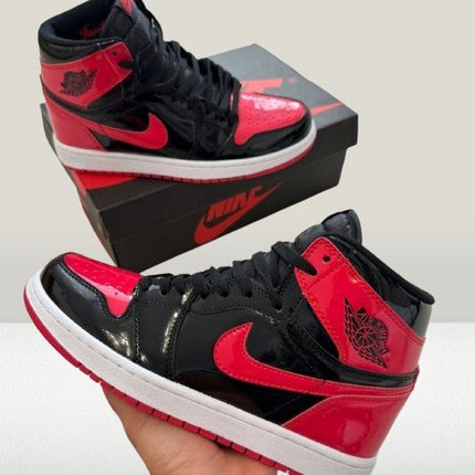 Red and black Air Jordan 1 Patent-Bred high-top sneakers