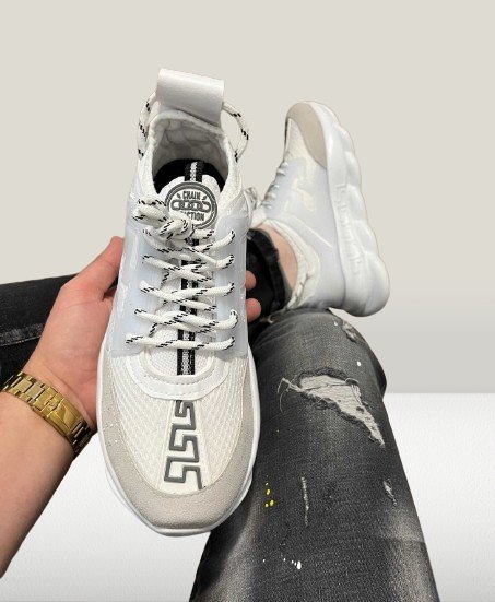 Versace Chain shoes in hand