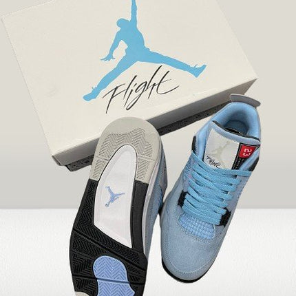 back side view of Jordan 4 University Blue sneakers
